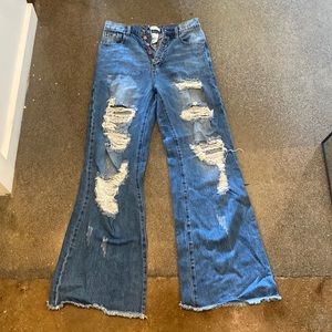 Vibrant flare high waisted ripped jeans